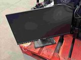 a picture of a computer monitor on a pallet in a warehouse