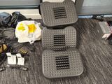 two pedals that are on the floor next to a window