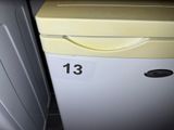 a small refrigerator with a number on the side of it