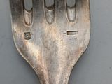 a fork that is sitting on a table