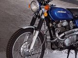 a motorcycle that is parked in a garage