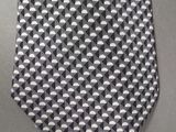 a close up of a neck tie on a table