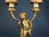 an image of a pair of lamps that are on top of a table