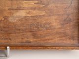 a close up of a wooden box on a table