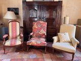 two chairs and a table in a living room