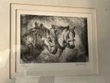 a picture of a drawing of two horses and a man