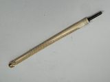 a pen that is laying on a table