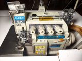 a close up of a sewing machine on a table