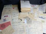 a lot of papers that are sitting on a table