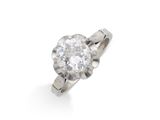 une bague à une pierre en diamant,