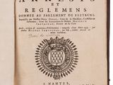 an open book with a picture of a coat of arms on it