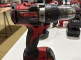 a cordless drill that is sitting on a table