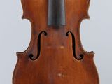 an old violin with a bow on a white background