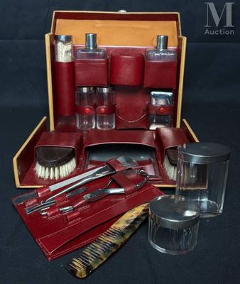 an image of a red leather case with tools in it