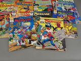 a lot of comic books that are on the table