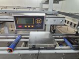 an image of a machine that is working in a factory