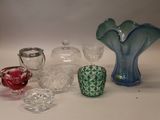 a lot of glass items sitting on a table