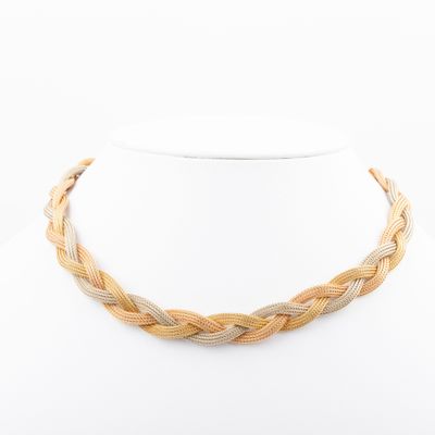 a yellow and white braid necklace on a mannequin mannequin