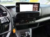 a car dashboard with a digital display on the dash
