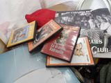 a pile of dvds sitting on top of a table