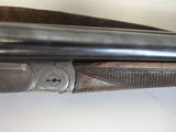an image of a close up of a gun on a table