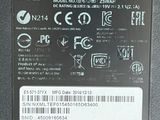 the back side of a laptop with a sticker on it