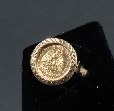 Bague en or 750/°°° retenant une pièce d'or 900/°°° de 2 pes…