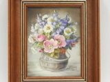 une peinture à l'huile représentant des fleurs dans un vase sur une table
