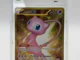 a close up of a pokemon card in a plastic case