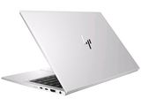 the laptop is open on a white surface with a black keyboard