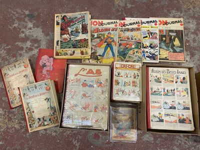 beaucoup de vieilles bandes dessinées par terre