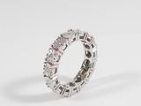 a close up of a diamond and white gold ring on a white background