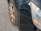 a picture of a car that is parked on the side of the road