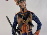 figurine of a soldier in uniform with a rifle