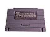 a purple nintendo game console sitting on top of a white table