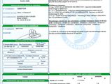 a green and white document with a picture of a person on it