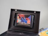 a nintendo game in a black case on a table