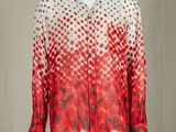 an image of a mannequin mannequin wearing a red and white shirt