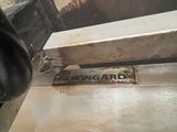 a sign that says longard on the side of a machine