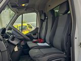 a white van with two seats in the back of it
