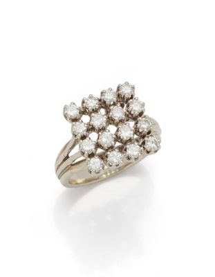 a diamond cluster ring, by van cleef
