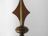 a close up of a metal pole with a star on it