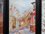 a picture of a painting on a chair in front of a wall