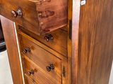 an image of a wooden desk with a drawer on it