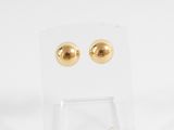 a pair of gold plated earrings on a clear acrylic stand