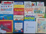 many children ' s books that are on the table