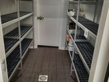 an image of a room with a bunch of shelves