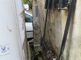 a truck that is parked next to a building