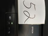 a piece of paper that has been taped to a printer