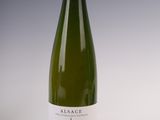 a bottle of wine that is sitting on a table